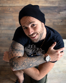 A headshot of the travel filmmaker Mike Corey