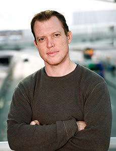 a headshot of author Rolf Potts