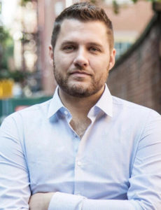 A portrait photo of author Mark Manson