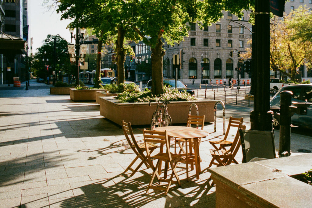 Table and chairs in city environment